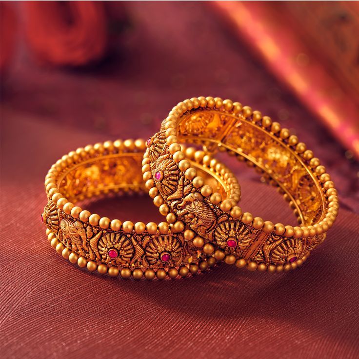 GOLD BANGLES